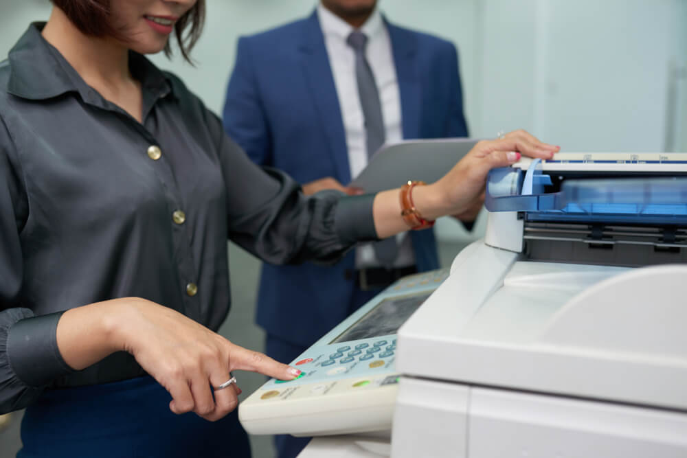 Smiling Office Assistant Using Multi-Function Printer