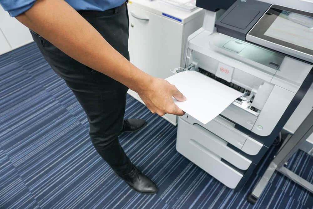 A Man Is Printing Document 