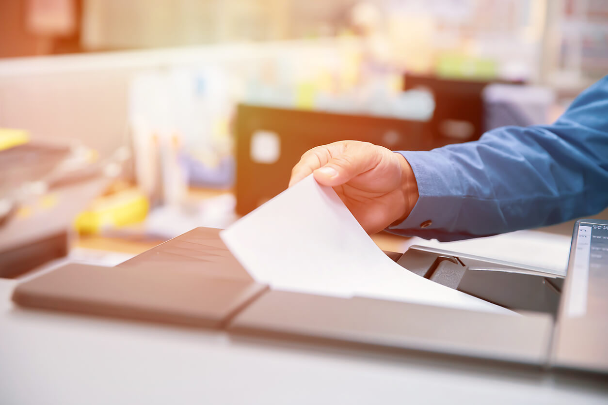 Businessman Using a Printer