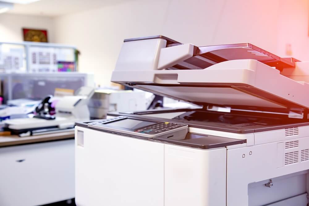 Close-up Photocopier or Printer Is Office Worker Tool Equipment for Scanning and Copy Paper