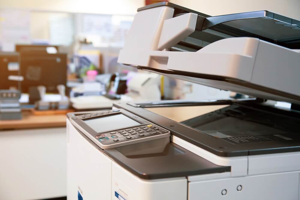 Photocopier or Printer as Office Worker Tool Equipment for Scanning and Copy Paper